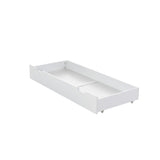white cot under drawer