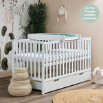 White Bantam Cot Bed with rails on all 4 sides, teething rail, 3 levels, optional under drawer & optional cot top changing unit in nursery setting.