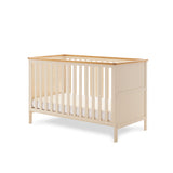 Cot Bed with solid ends & wooden trim on the top of all 4 sides