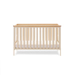 Cot Bed, base on the lowet setting, with solid ends wooden trim on all 4 sides