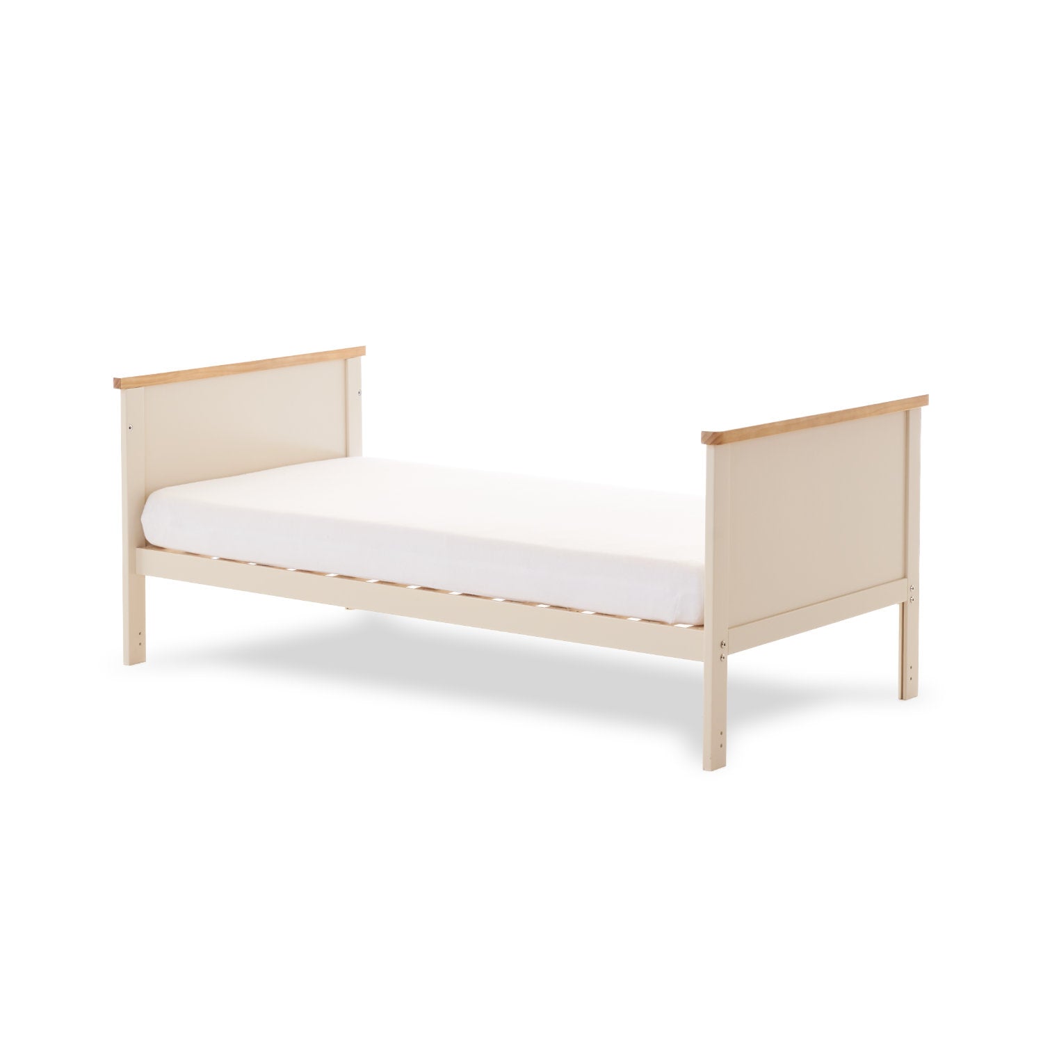 Cot Bed converted into a toddler bed by removing sides & lowering solid ends. Wood Trim on the top