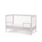 Cot Bed converted with toddler rails for toddler bed