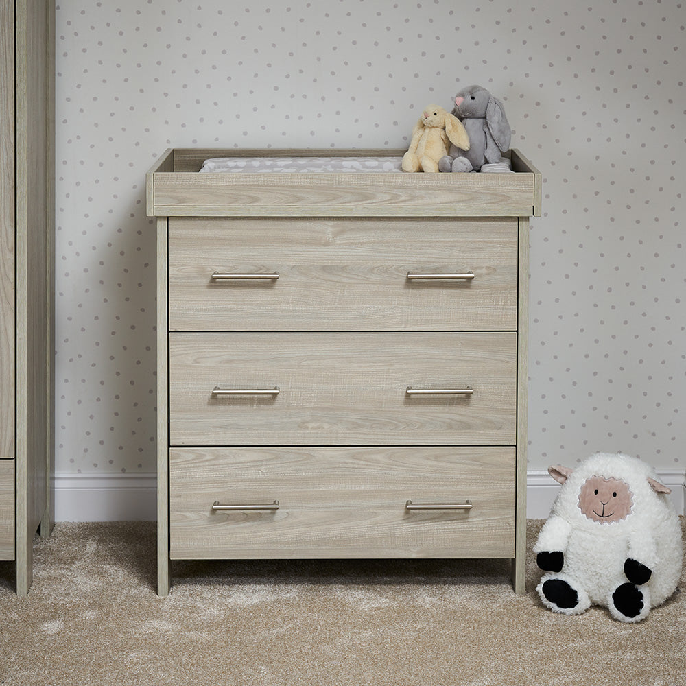 Changing unit with 3 drawers with metal handles