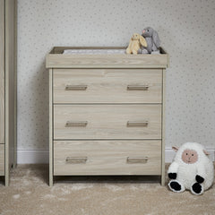 Changing unit with 3 drawers with metal handles