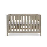 Cot Bed with solid ends, base at middle setting.