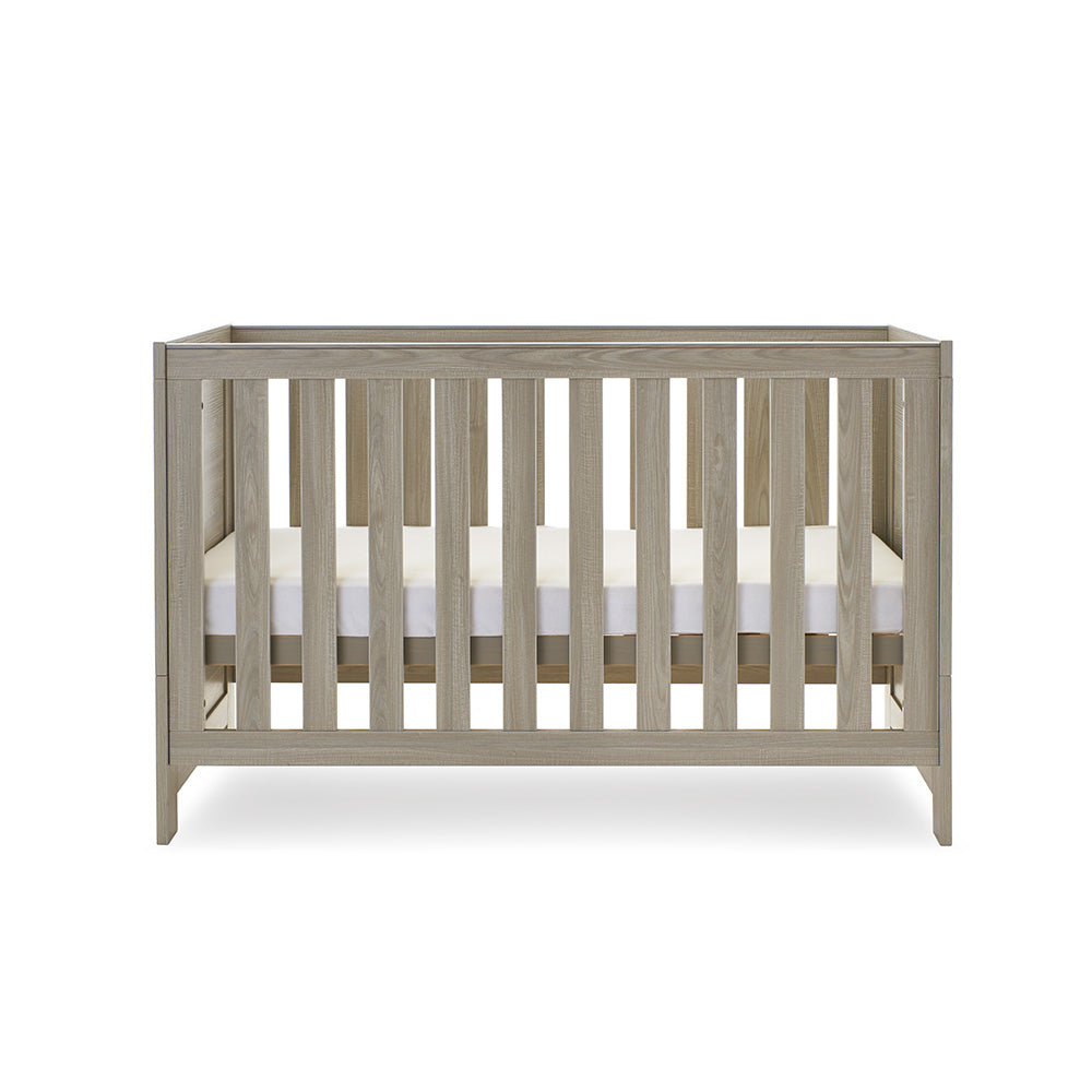 Cot Bed with solid ends, base on the middle setting.