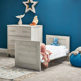 Mini Cot Bed converted into toddler bed with toddler side
