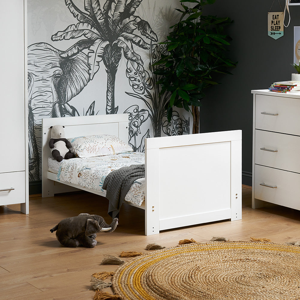 Mini Cot Bed converted into toddler bed, with soild ends