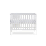 small cot with rails on 4 sides, teething rail on 2 longer sides.