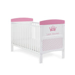 Cot Bed, base on the lowest setting, teething rails on sides, solid ends with printed front & matching pink trim.