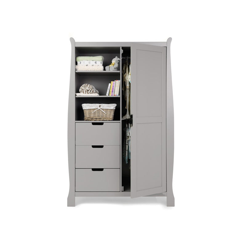 Sleigh double wardrobe with curved sides, left hand side has 3 display shelves with drawers underneath, right hand side has a full length door open showing 2 rails inside, all handles are open cut outs.