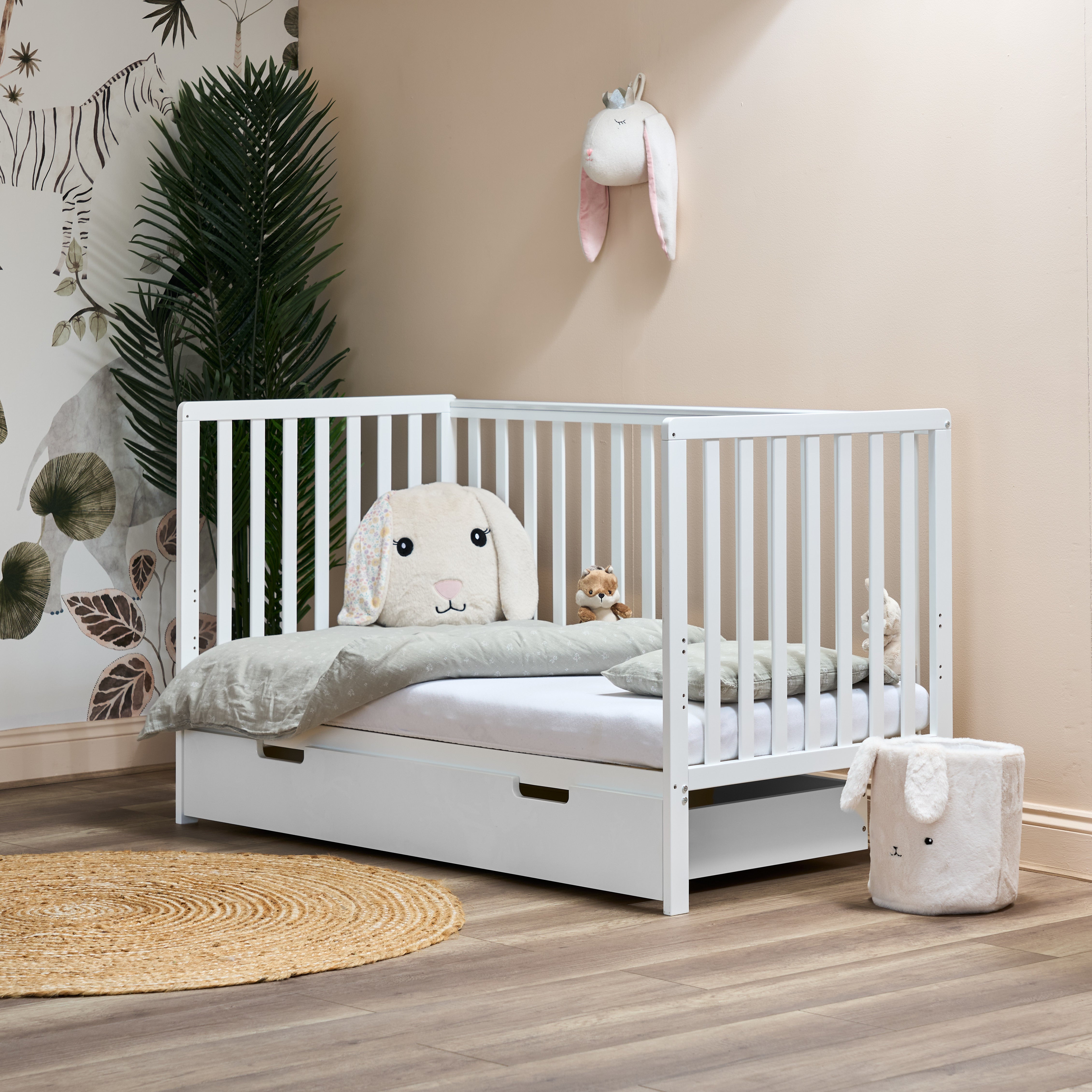 White cot bed bantam, in toddler bed, day bed mode, with optional under drawer.