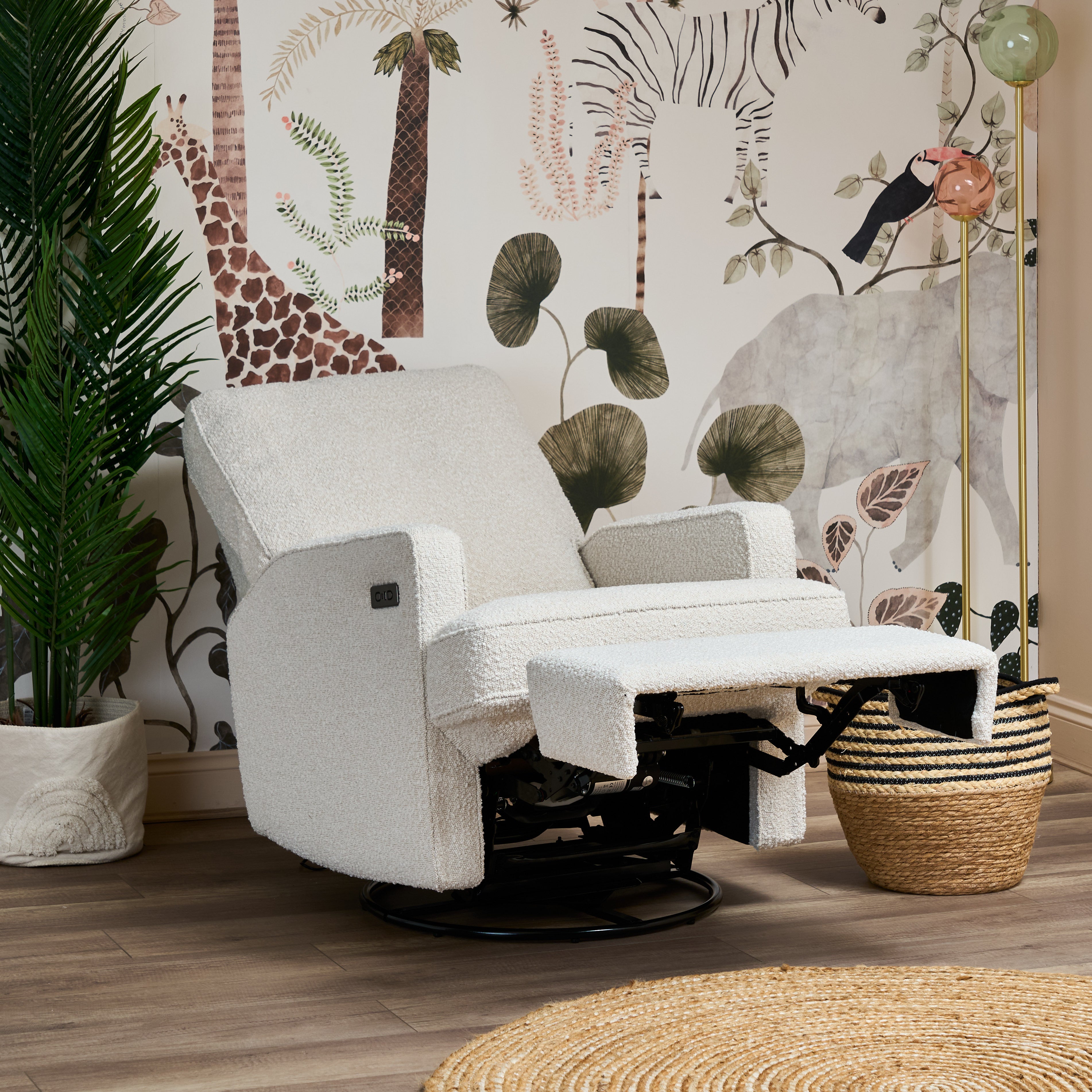 Reclining gliding chair in Boucle fabric in reclined position