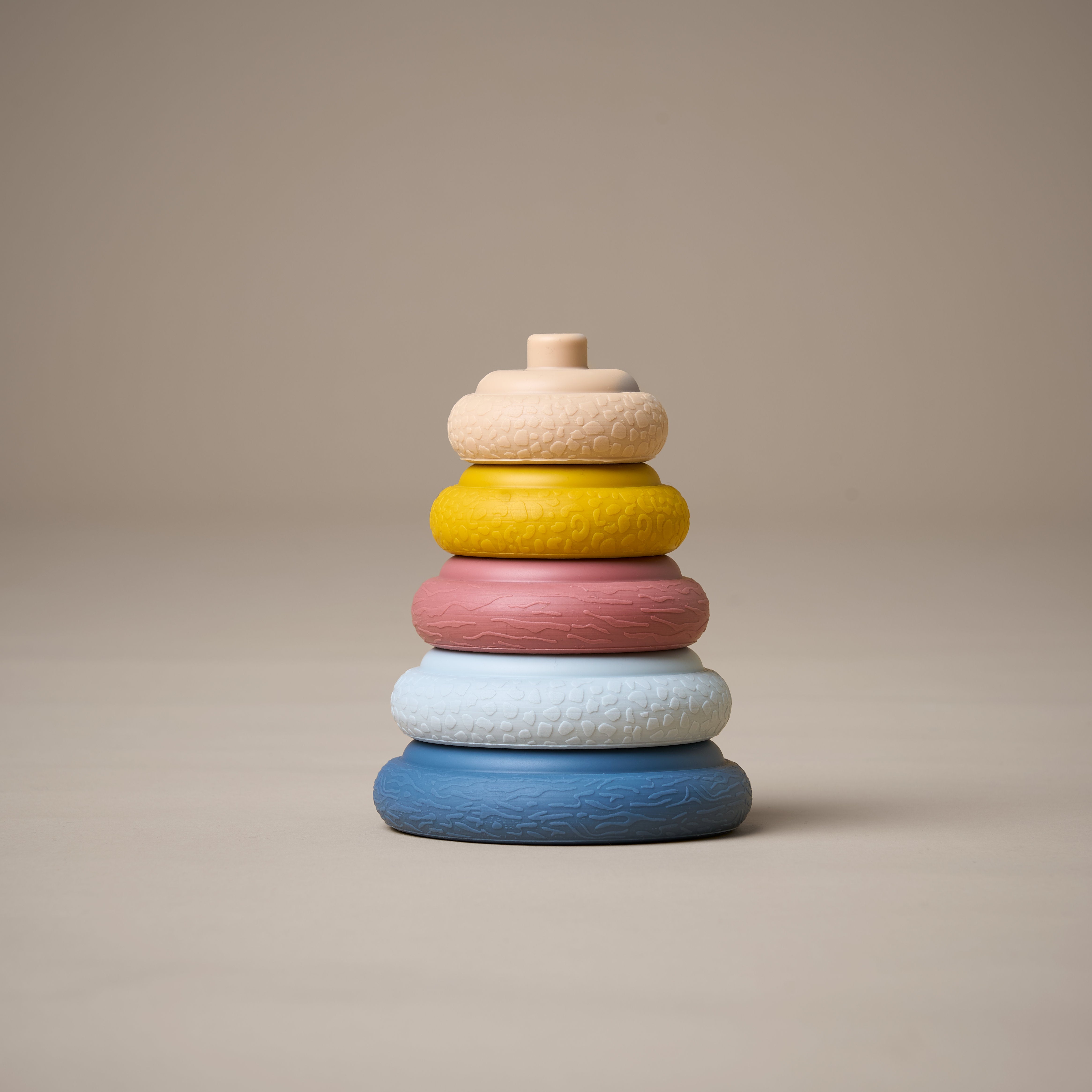 Stacking rings stacked in a variety of different textures and colours