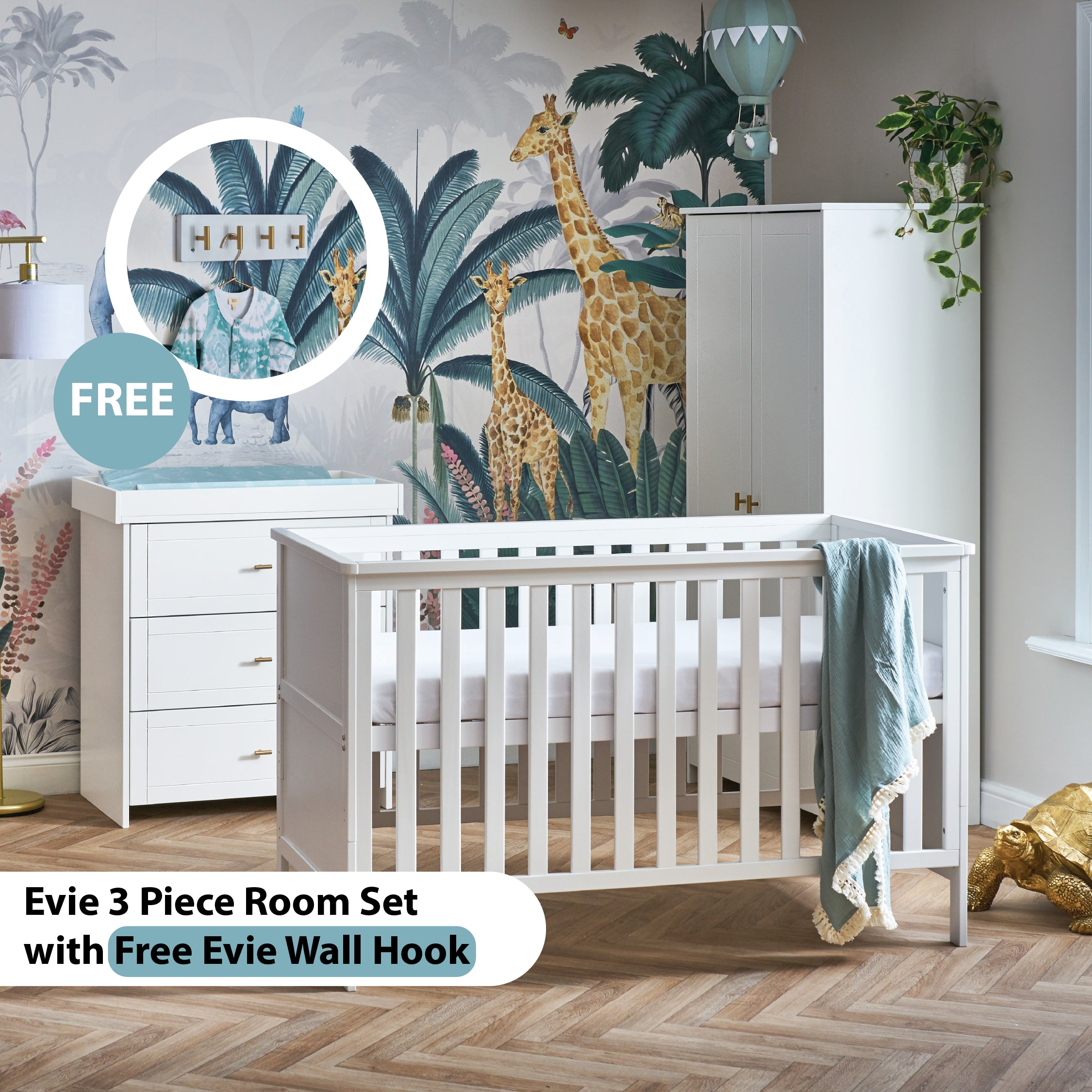 Nursery room set with white cot bed, changing unit, and wardrobe featuring munk & me wall mural. 