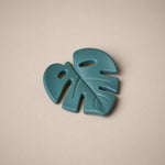 Leaf shaped teether in dark green colour