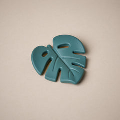 Leaf shaped teether in dark green colour