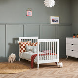 White Cot Bed converted into toddler bed by removing side panels