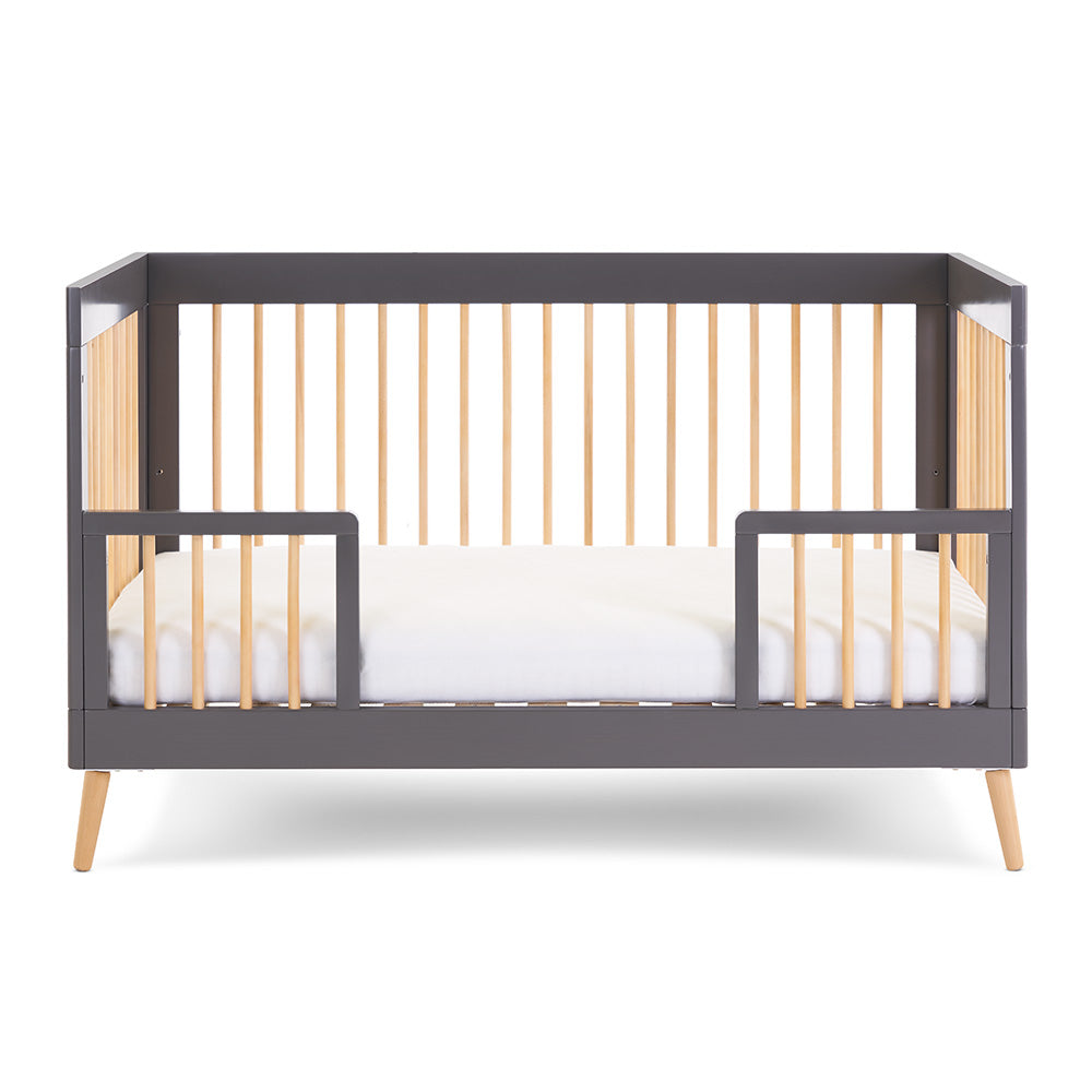 Scandi Cot Bed that shows includes toddler safety rails & easy to convert 