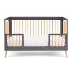 Scandi Cot Bed that shows includes toddler safety rails & easy to convert 