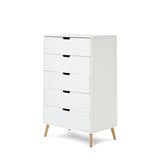 Tall chest of drawers with 5 drawers with open cut out handles. 