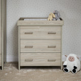 Changing unit with 3 drawers with metal handles 