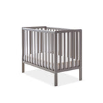 Compact Cot with rails on all 4 sides base on lowest setting.  Teethign rails on both sides. 
