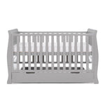 Sleigh Cot Bed, with curved edges, solid ends, side rails have teething rails . Base is on new born setting. 
