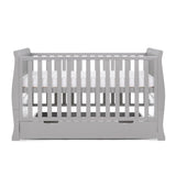 Sleigh Cot Bed, with curved edges, solid ends, side rails have teething rails . Base is on new born setting. 