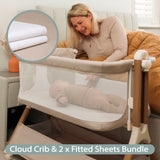 Oatmeal Bedside crib with wood effect frame. mesh sides, with sleeping baby in crib & mum looking on from her own bed & mini shot of muslin fitted sheet.