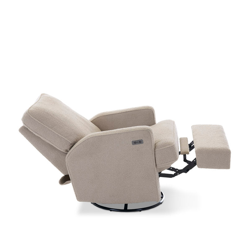 Side view of teddy truffle electric nursery chair, in reclined position, showing footrest & backrest extended out. Showing swivel base, arm rest has the electric recline buttons, next to the usb/c charging points. 