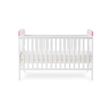 Cot Bed with solid ends, curved top, teething rails & base on middle setting.