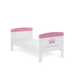 Cot Bed converted into toddler bed with printed pink princess artwork. 