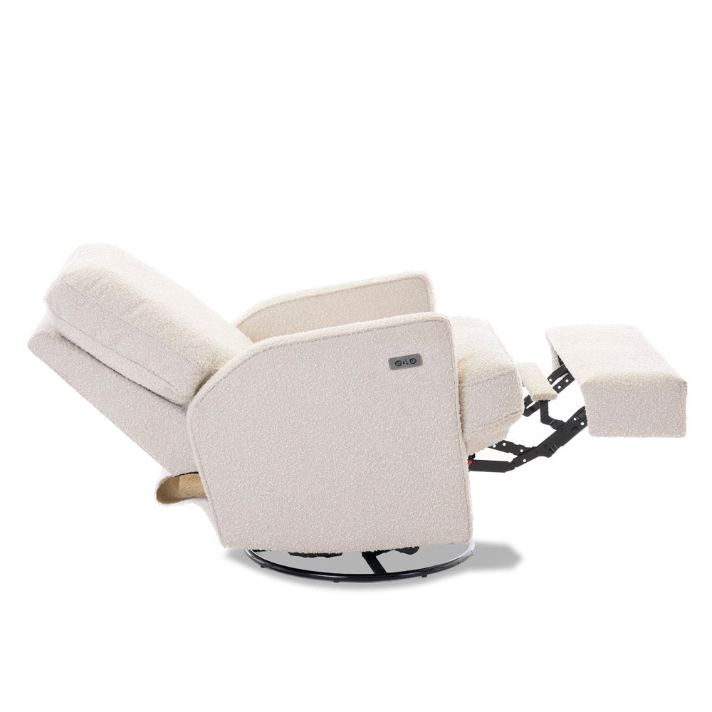 Fully Reclined nursery chair, showing the footrest extended out, the backrest reclined. and showing usb/usbc port next to electric recline buttons. 