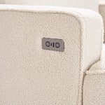 Teddy Ivory Fabric from Madison nursery chair, showing armrest with recline button next to the usb/c charging ports.