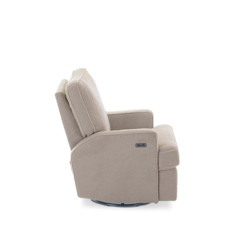 Madison nursery electric chair in teddy truffle fabric, side view showing swivel base & electric switch next to the usb/c port on the armrest. 