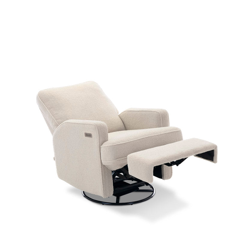 Teddy Ivory Fabric Nursing Chair with electric recline & footrest showing the swivel base. Armrest has the usb/c charging port next to the recline button. 