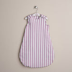 Purple and white striped muslin baby sleeping bag with press stud aroudn the shoulder & arms 