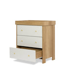 3 drawer changing unit with oak sides & white drawer fronts finsihed off with gold round handles, baby changing top fitted but can be removed, so ideal for lifetime storage. Bottom drawer open, showing drawer runners. 
