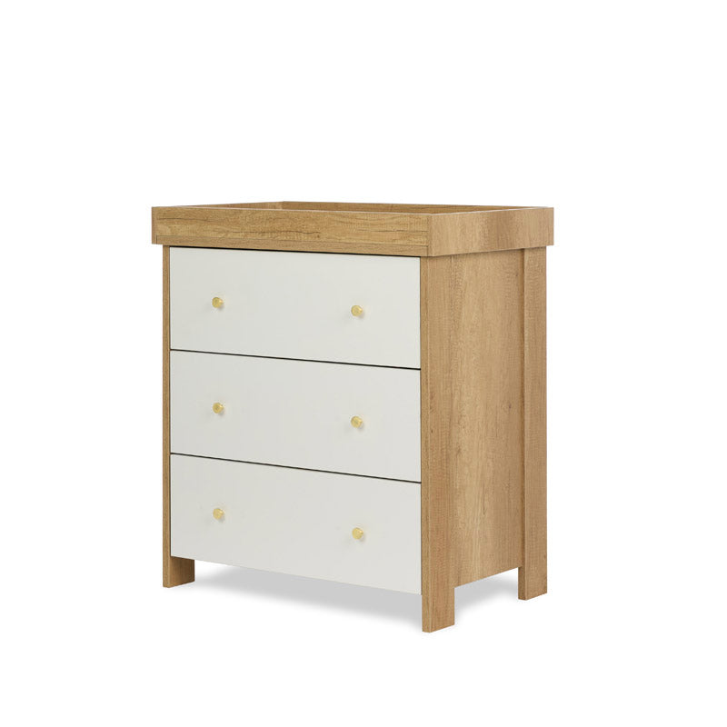 3 drawer baby changing unit, with oak effect sides & white drawer fronts finished with round gold handles. Removable changing top fitted for changing babies. 