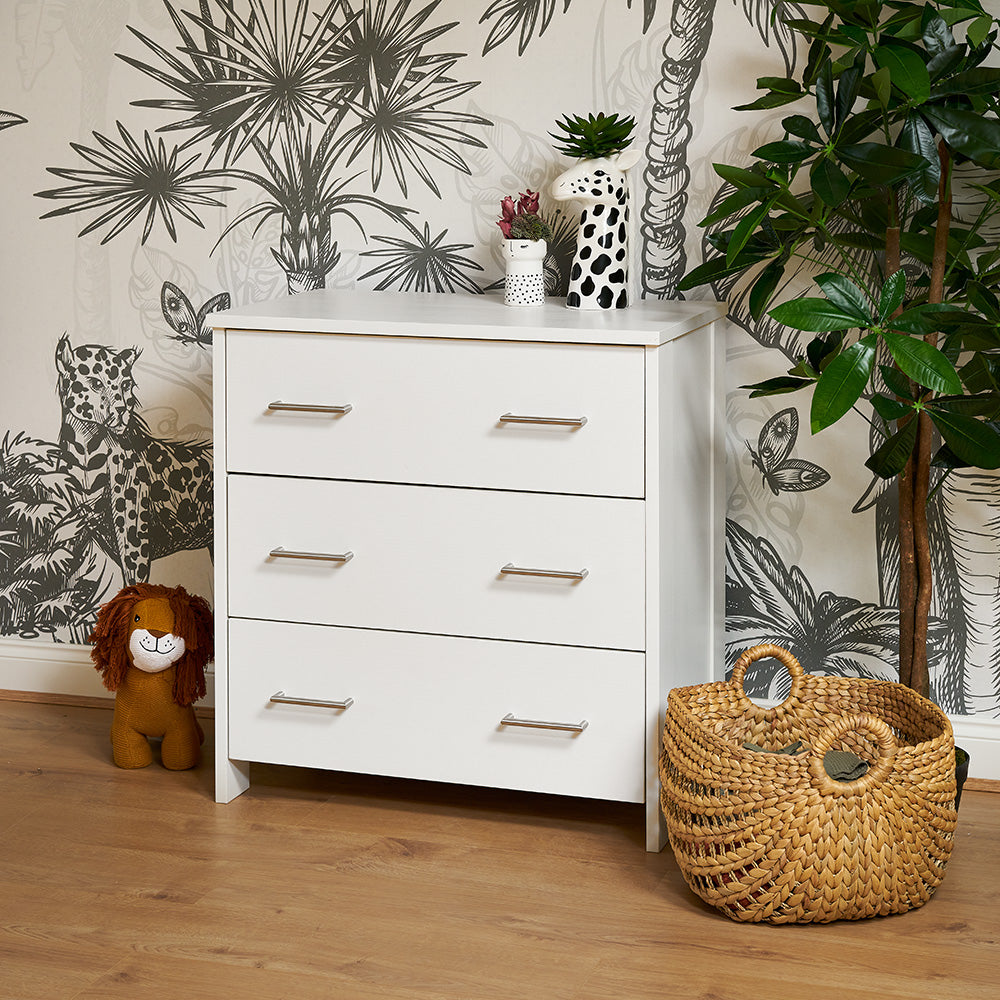 dresser with 3 drawers & metal handles. changing top removed. 