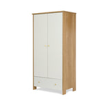 wardrobe with oak sides & white fronts, 2 doors, drawer at the bottom, finsihed with gold round handles.