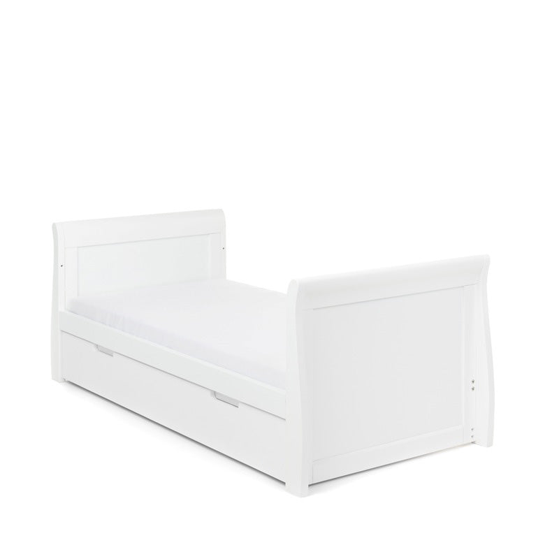 Sleigh Cot Bed with curved edges & solid ends, converted into a toddler bed, but lowering the solid ends & removing the sides. Under drawer included with cut out handles. 