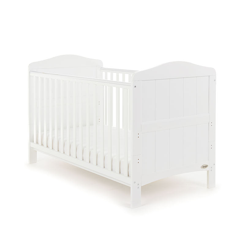 Traditional White Cot Bed with solid ends & rails on the side with teething rail.