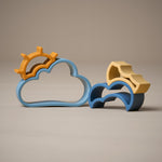 Front view of stacking cloud and sun shapes toy