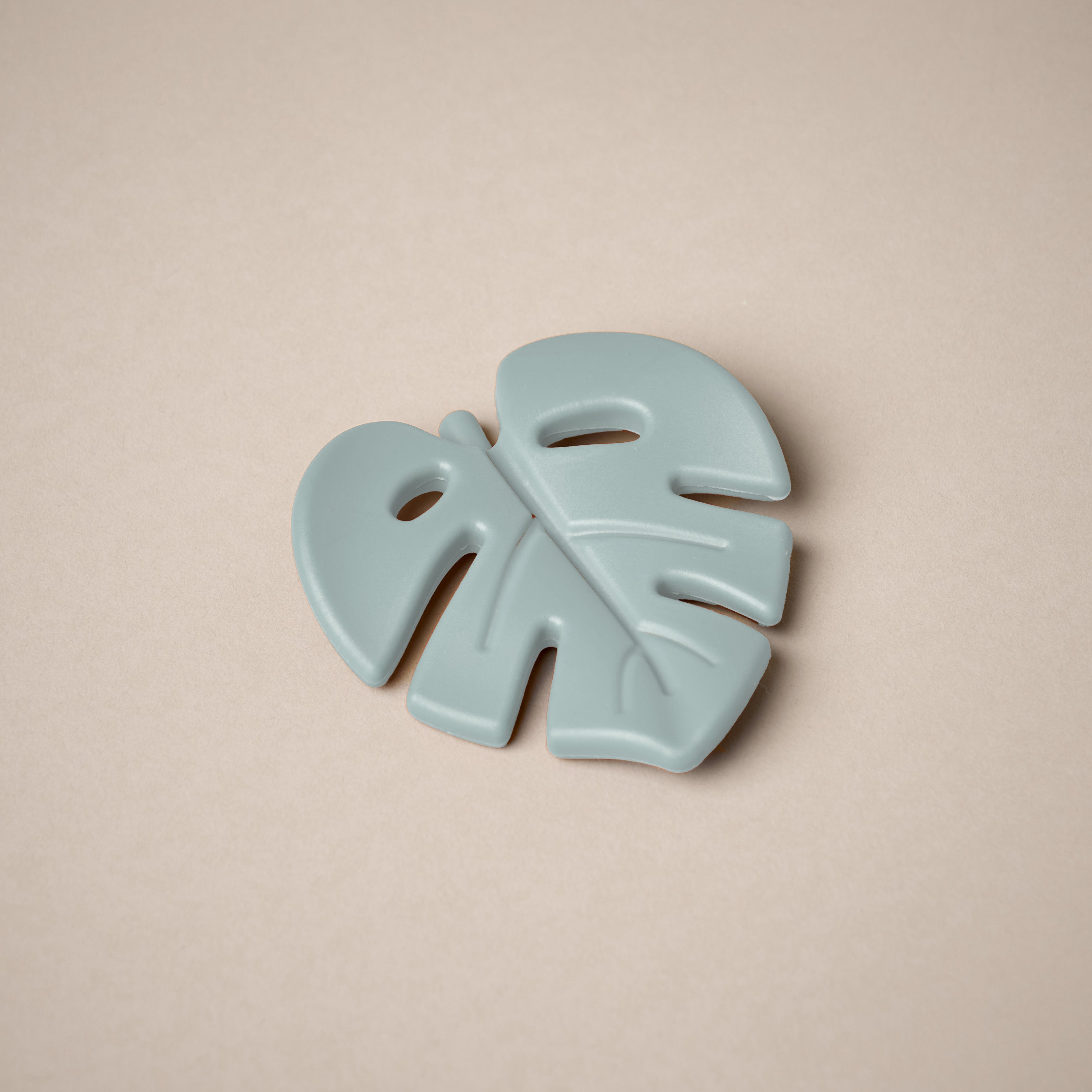 Leaf shaped teether in sage green colour